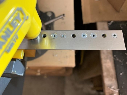 Installing nutplates with counter-sunk rivets.