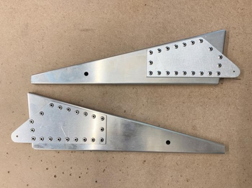 Completed aileron drive rib assemblies.