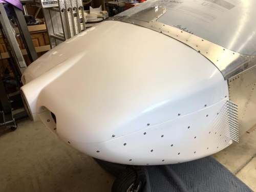 Cowling pieces fit and secured with bolts along windscreen skirt and sides.