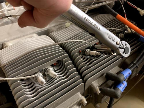 Reinstalling exhaust side spark plugs with CHT sensors between the crush washer and plug.