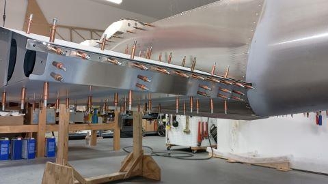 Rear spar match drilled into position