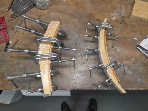 After forming and then reclamping into epoxied laminates