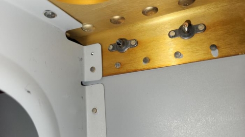 See that rivet hole at the rib, to the left of the nut plate? That needs a rivet!