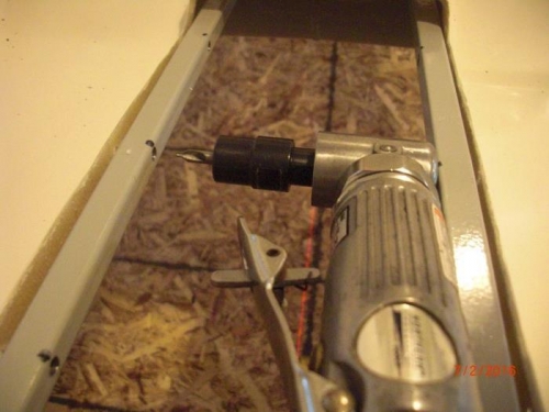 A center drill in a die grinder allows for drilling holes perpendicularly