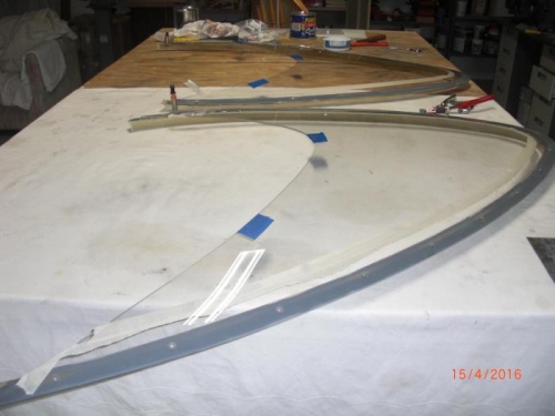 plexiglass glued and riveted to track