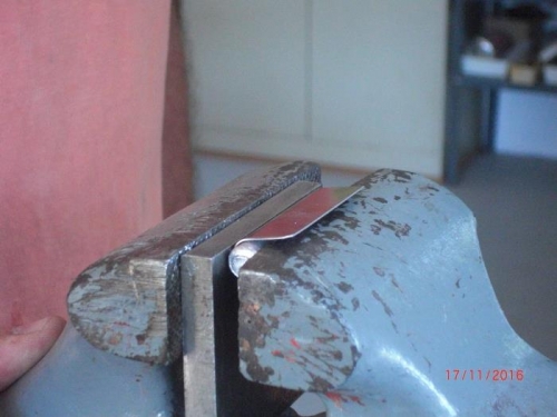 bending upper and lower striker plate