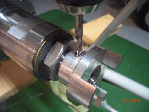 coupling holes drilled using a bushing