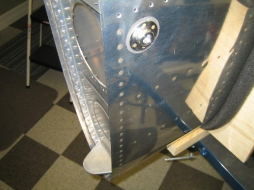 Inboard rib riveted in place