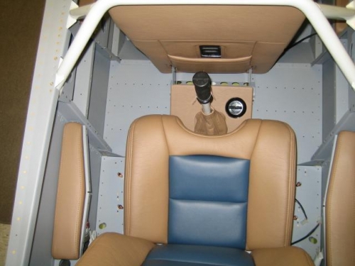Rear seat stick boots and armrests