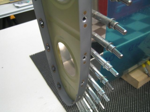 Splice plate clecoed to leading edge assembly