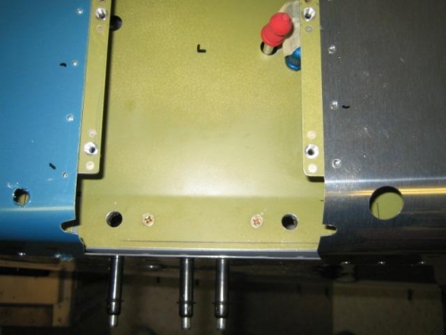 Bracket bolt access holes drilled