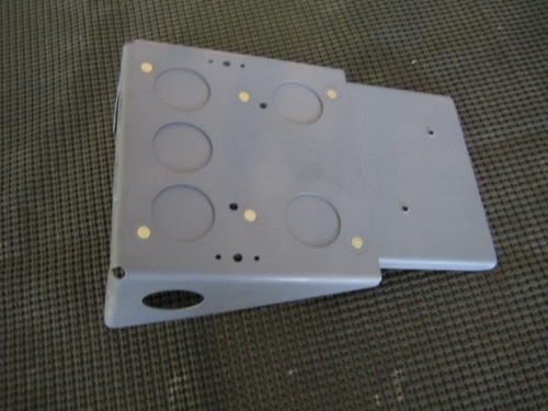 Tray riveted together