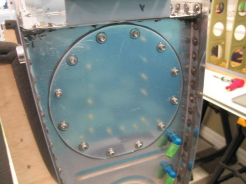 Access plate sealed in place