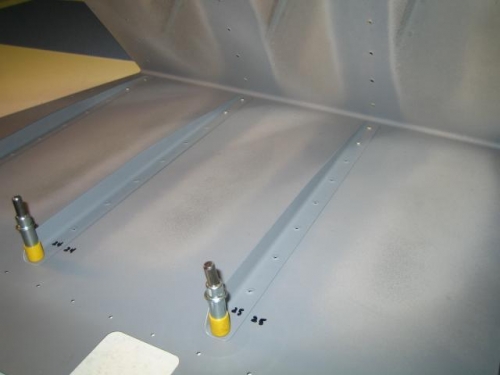 Rivet only the first 2 closest to trailing edge then flip the component