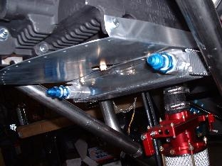 Oil cooler with fittings