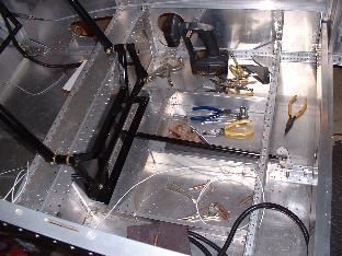 Control sticks and pushrod in place