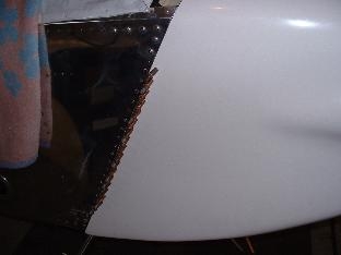 Right hinge clecoed in place