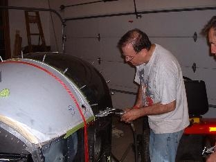 Drilling trim piece to canopy