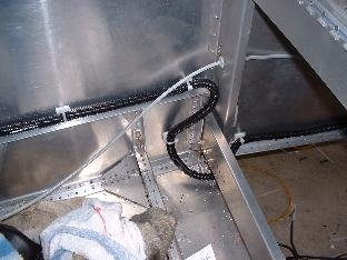 Harness at rear right seat root.