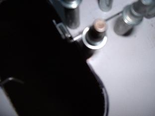 Hinge at oil cooler inlet