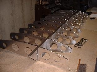 Ribs riveted to main spar