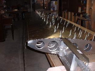 Left Aft skins in place. Fwd skin started