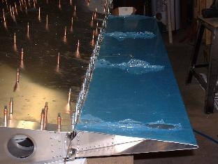 Checking fit of left flap