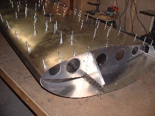 Forward skin drilled at leading edge