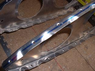 Dimpled leading edge rib