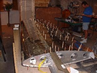 Partially completed riveting