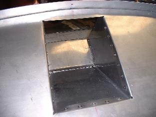 Front side of filler box assy at firewall