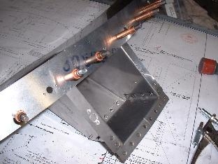 Upper firewall assy at windshield strap