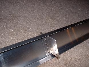Close up of bracket on skin splice channel