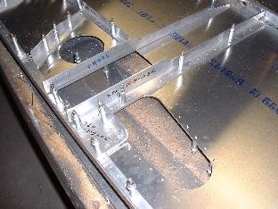 Support angles at left wing on fuse side assy