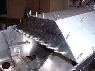 Glare shield & instrument panel clecoed in place