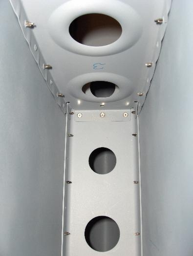 The pulled rivets on rib #3