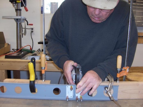 Me setting a bracket rivet