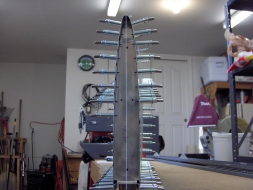 With rib and plumb bob