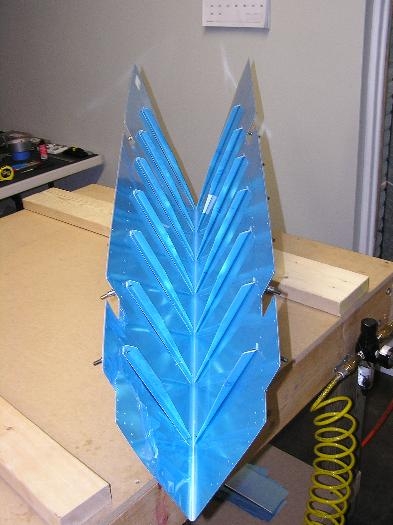 Stiffeners clecoed on