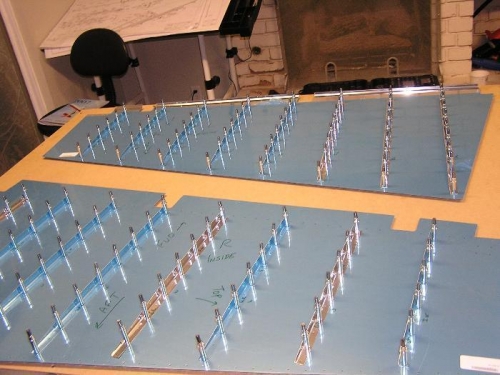 Stiffners clecoed on