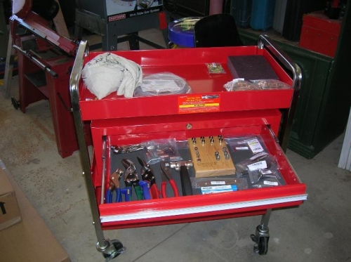 Top drawer of tool cart with misc tools