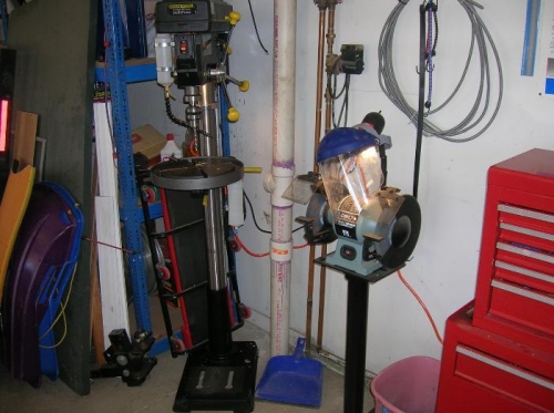 Drill press from Harbor Freight and Delta grinder on stand.