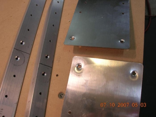 Dimpled spar tab holes, countersunk angle holes.