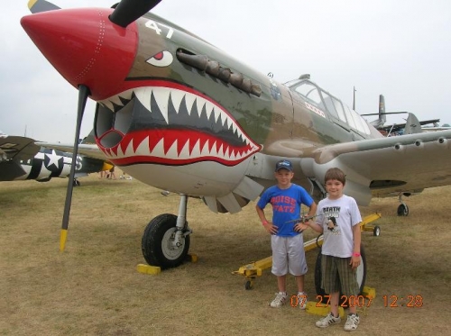 Colten and Tanner by a P-40 Warhawk.