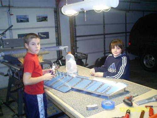Tanner and Joey clecoing the skin.
