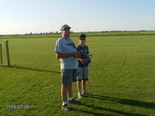 Gerry teaching Colten to fly RC