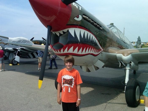 Tanner with his favorite, the P-40 Warhawk.