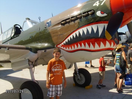Tanner and his favorite plane, the P-40.