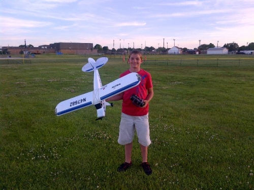 Colten with the Super Cub.
