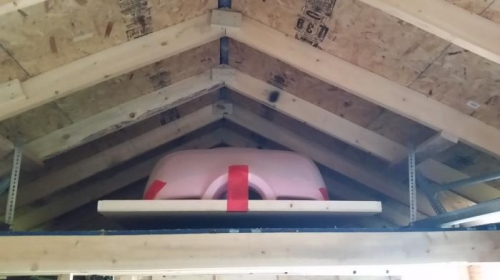 Canopy and cowling halves in shed loft.